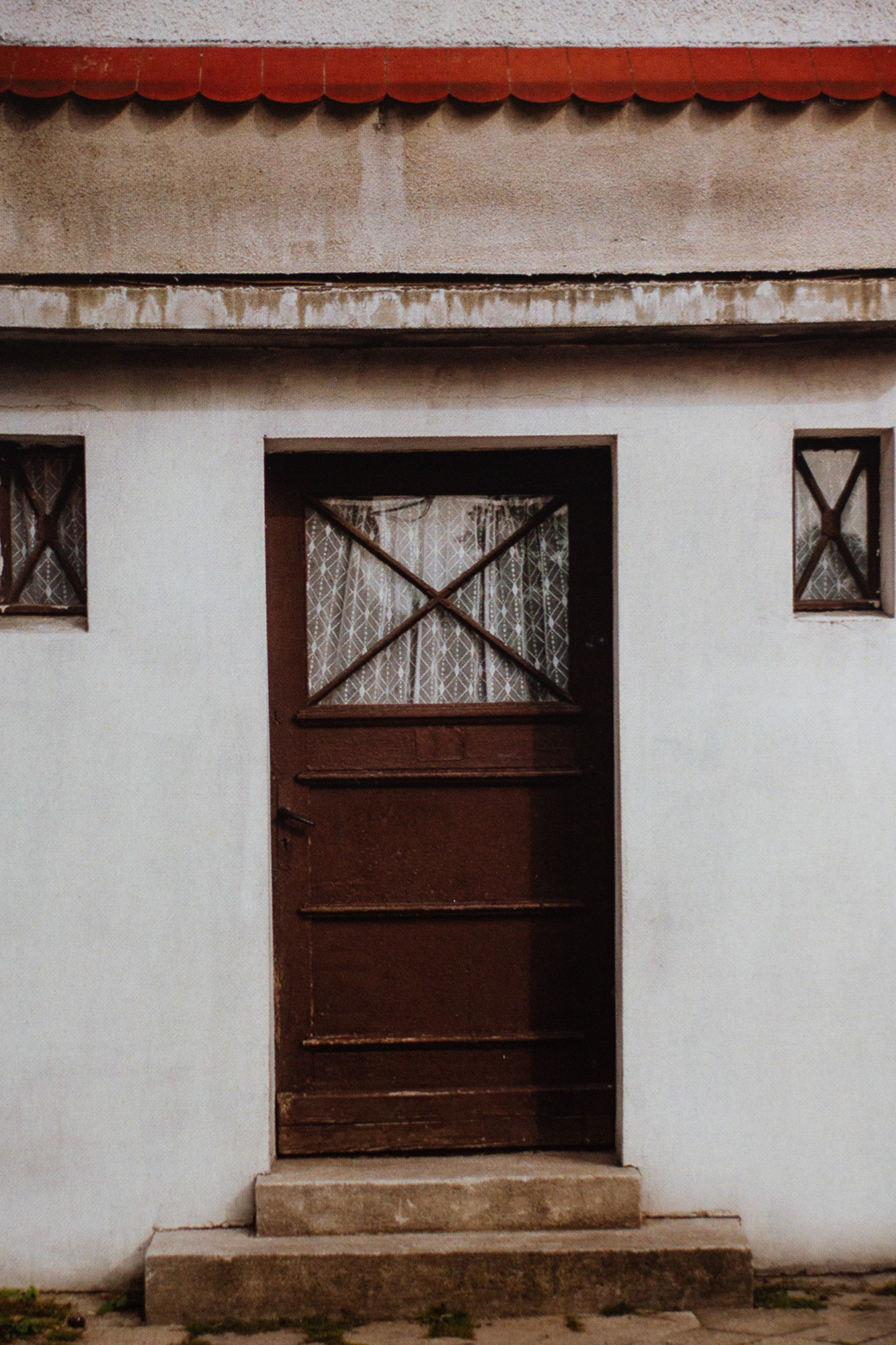 Drzwi, Barczewo, ul. Traugutta 36 z cyklu Przejście
